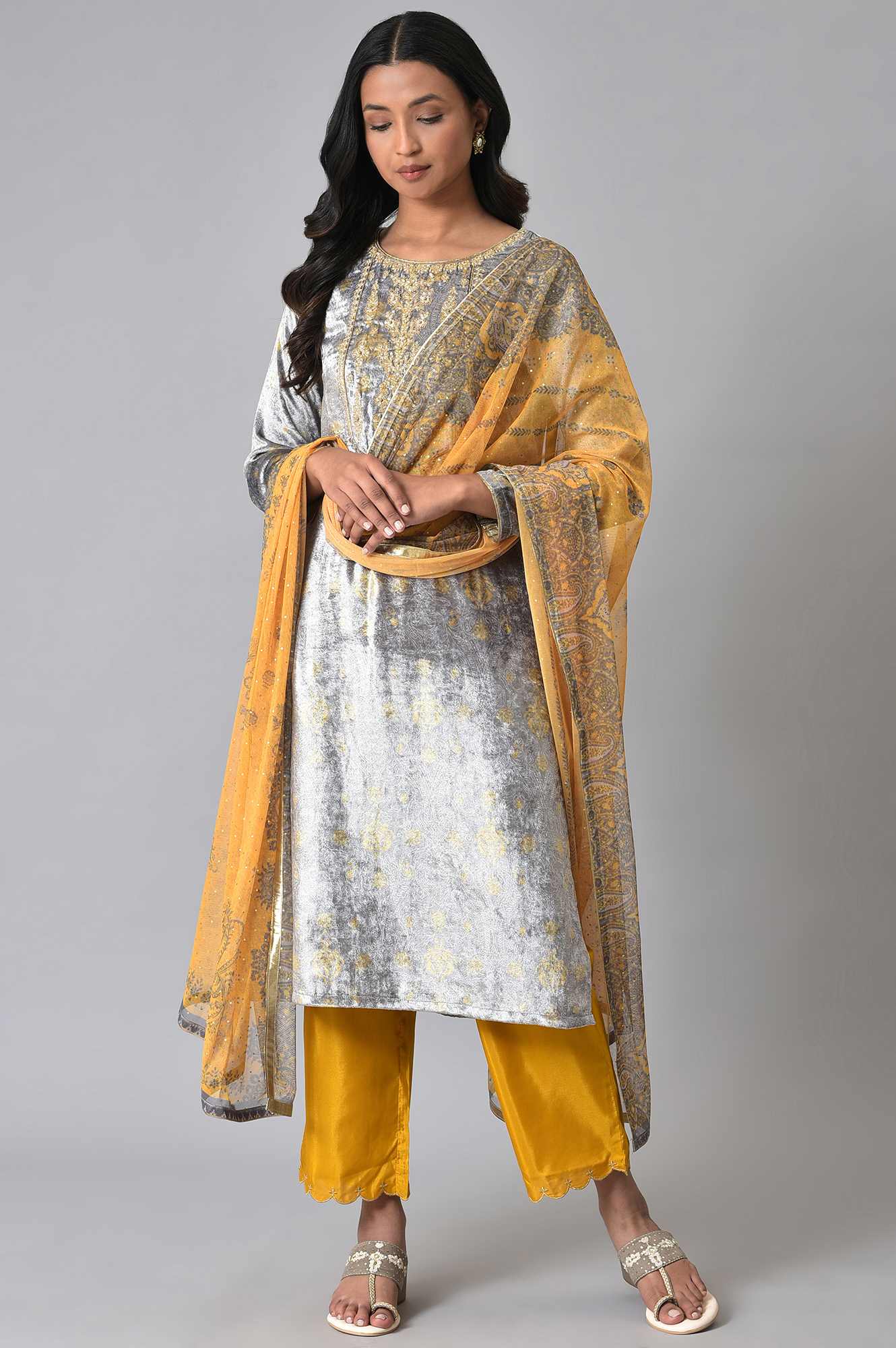 yellow and grey combination dress One of my favorite color combinations is butter yellow and grey. I love brightening up my neutral greys with a pop of yellow. The combination creates an elevated look with a bit